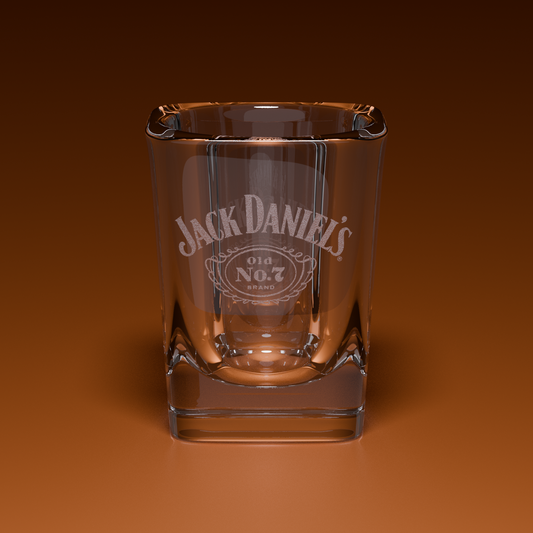 Custom shot glass engraved with the 'Jack Daniel's' logo on an orange background